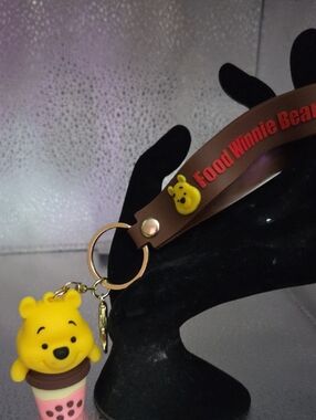Winnie the Pooh Yellow Charm Keychain with Brown Strap